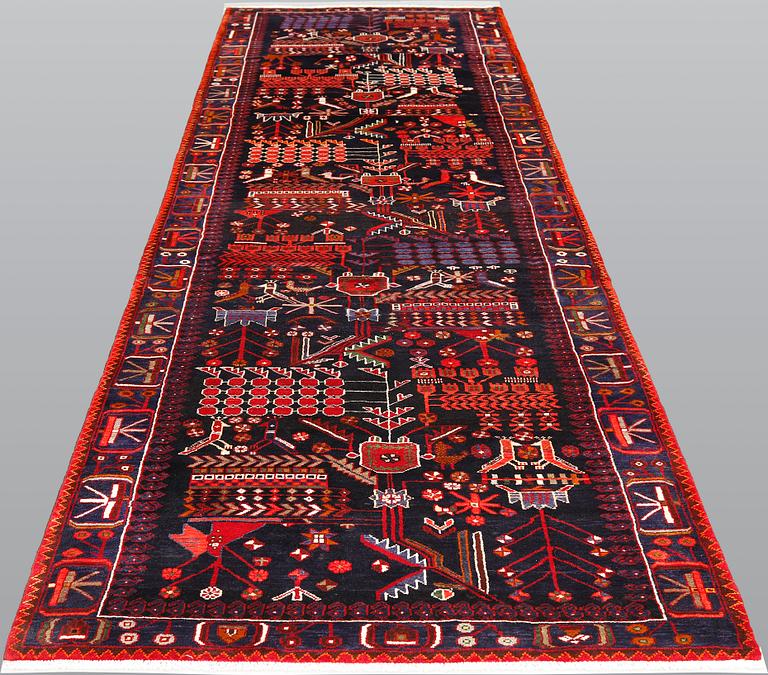 A pictoral Nahavand runner, c 420 x 130 cm.