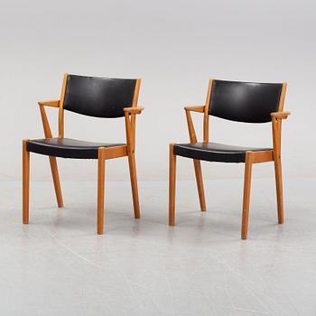 A pair of 1950's/60's armchairs.