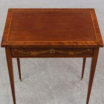 A gustavian style sewing table, early 20th century.