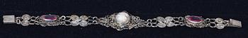 HALSBAND samt ARMBAND, vitmetall, stenar och camé.