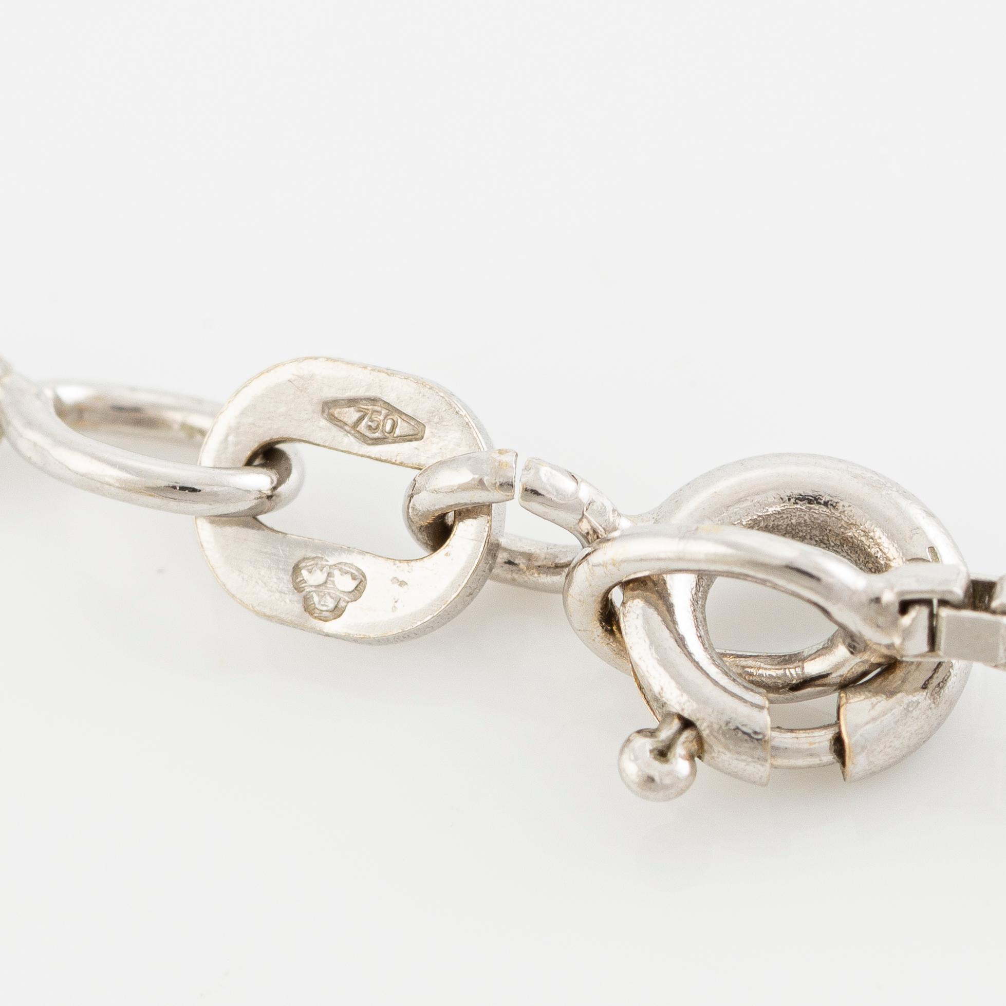 Pendant with chain in 18K white gold set with brilliant-cut diamonds.