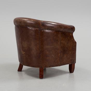 A leather club lounge chair by Newport, ca 2000.
