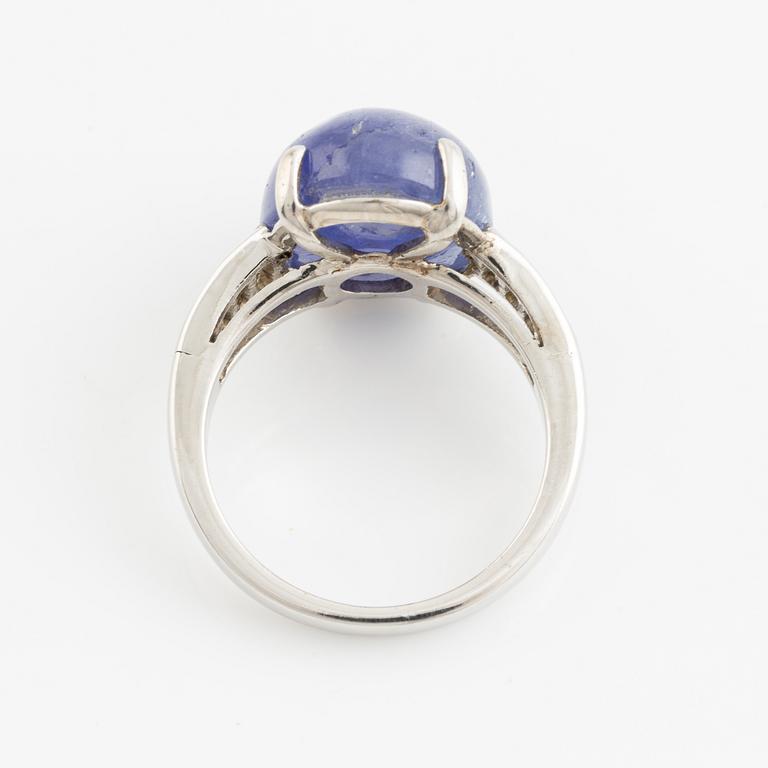 Cabochon cut tanzanite and baguette cut diamond ring.