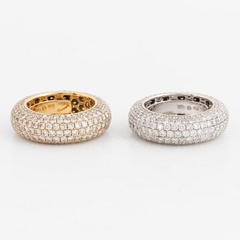 Two brilliant-cut diamond rings.