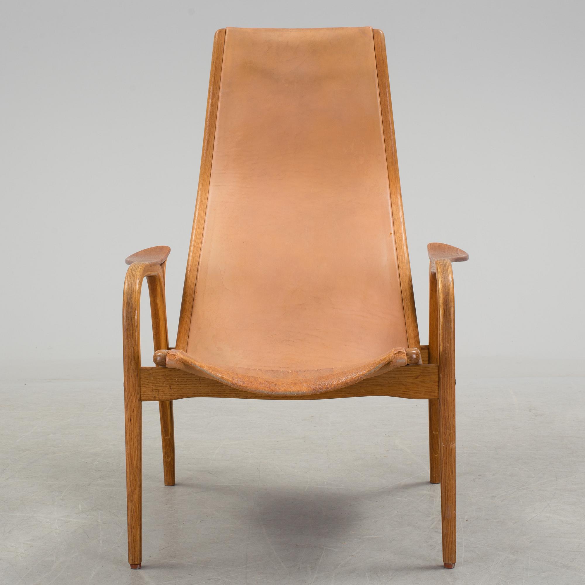 YNGVE EKSTRÖM, a 'Lamino' oak and teak easy chair from Swedese.