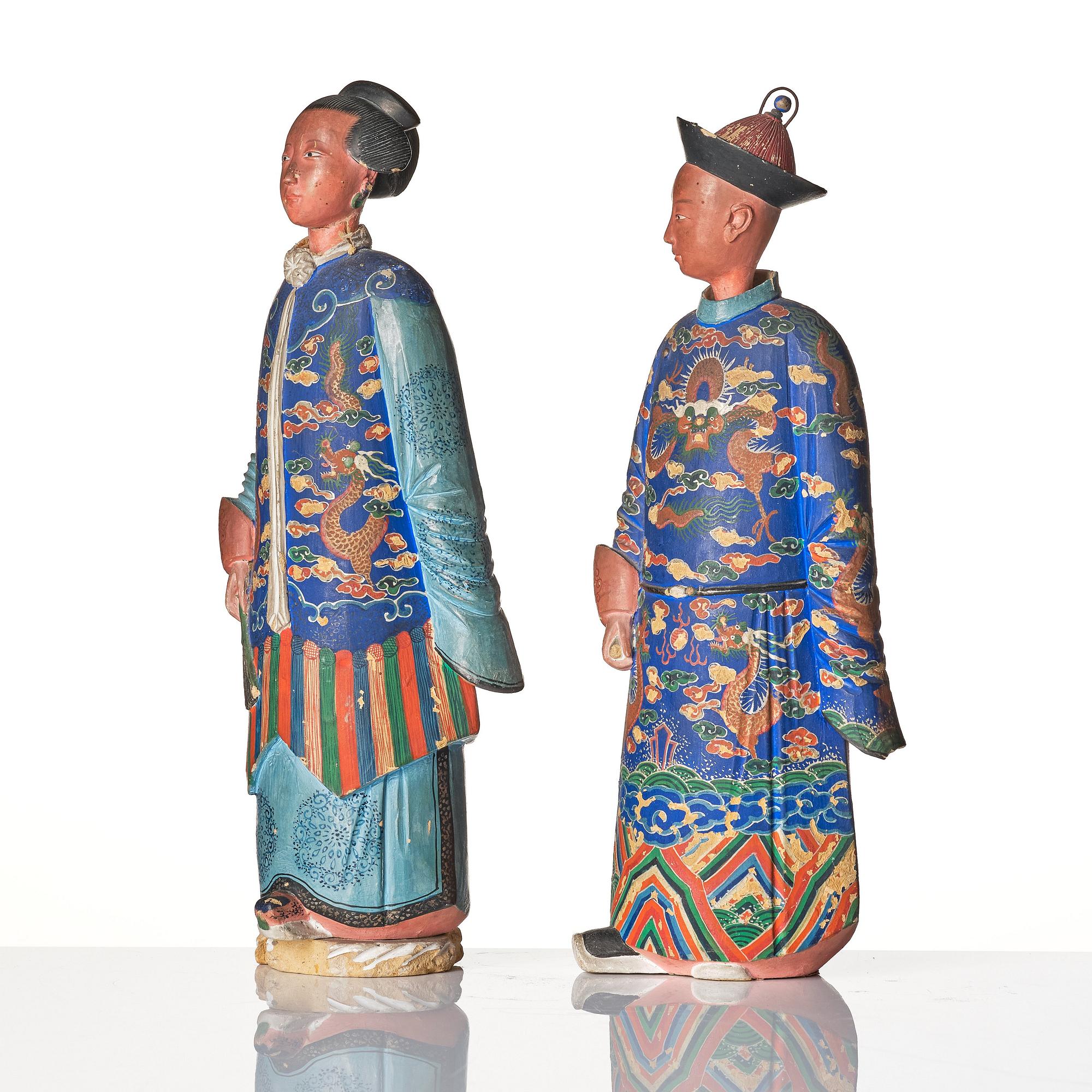 A pair of Chinese Export polychrome painted nodding head figures, Qing dynasty, early 19th Century.