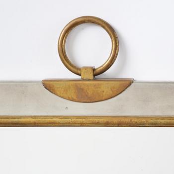 Firma Svenskt Tenn, a pewter and brass wall mirror model 2283, Firma Svenskt Tenn, Stockholm, 1952.