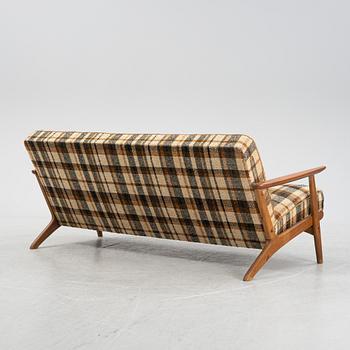 A teak sofa, mid 20th Century.
