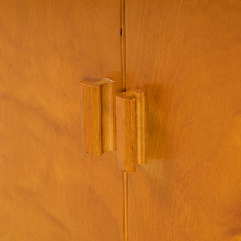 Three birch-veneered cabinets, 1930's/40's.