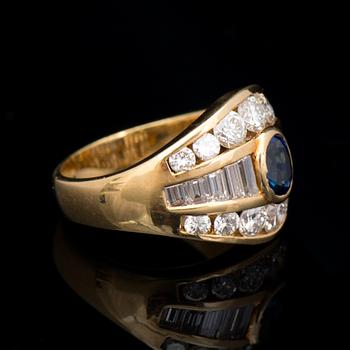 A RING, facetted sapphire, brilliant and baguette cut diamonds, 18K gold.