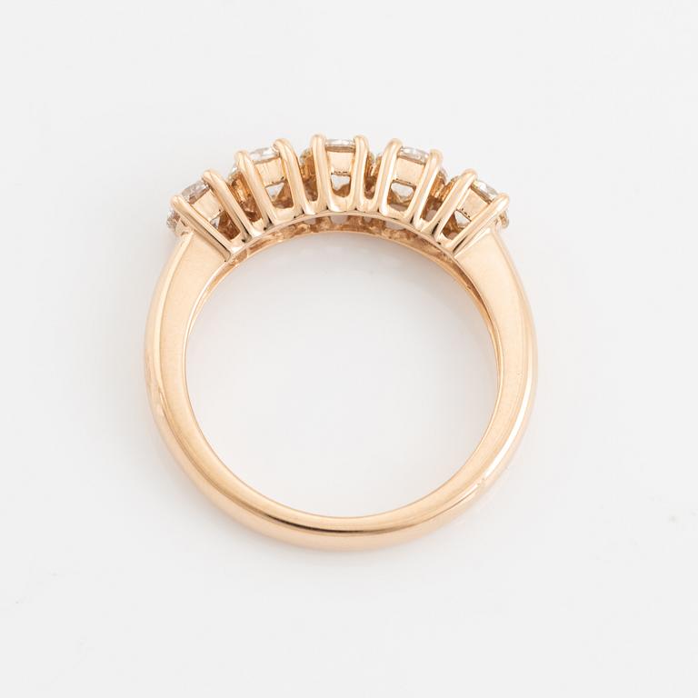 Brilliant cut diamond five stone ring.