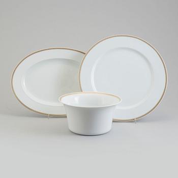 one bowl and two porcelain plates, 'Médaillon Méandre d'Or', Ikarus, by Versace for Rosenthal.