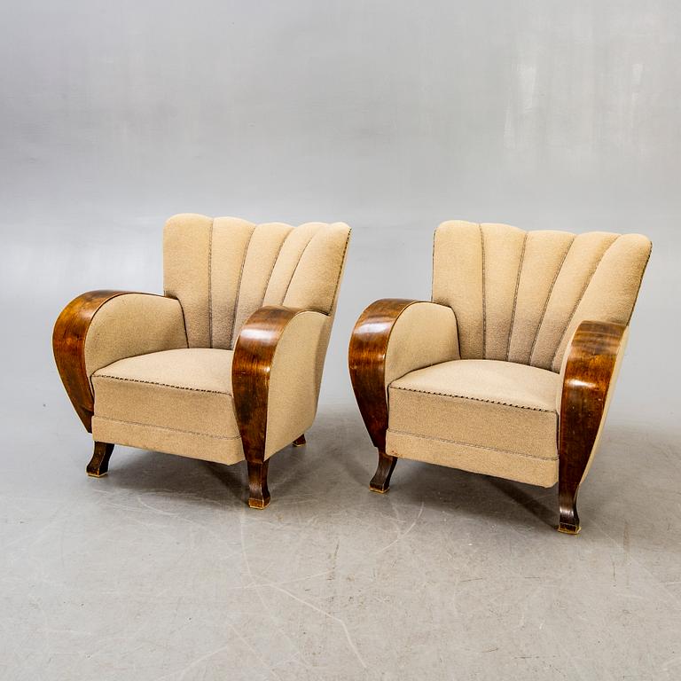 A pair of Art Deco armchairs.