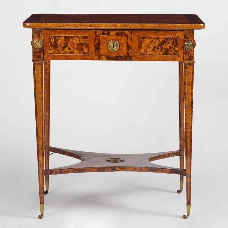 A Gustavian burr-parquetry and bilt brass-mounted table by A. Lundelius (master in Stockholm 1778-1823).