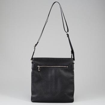 LOUIS VUITTON, a black Taiga bag, 2012.