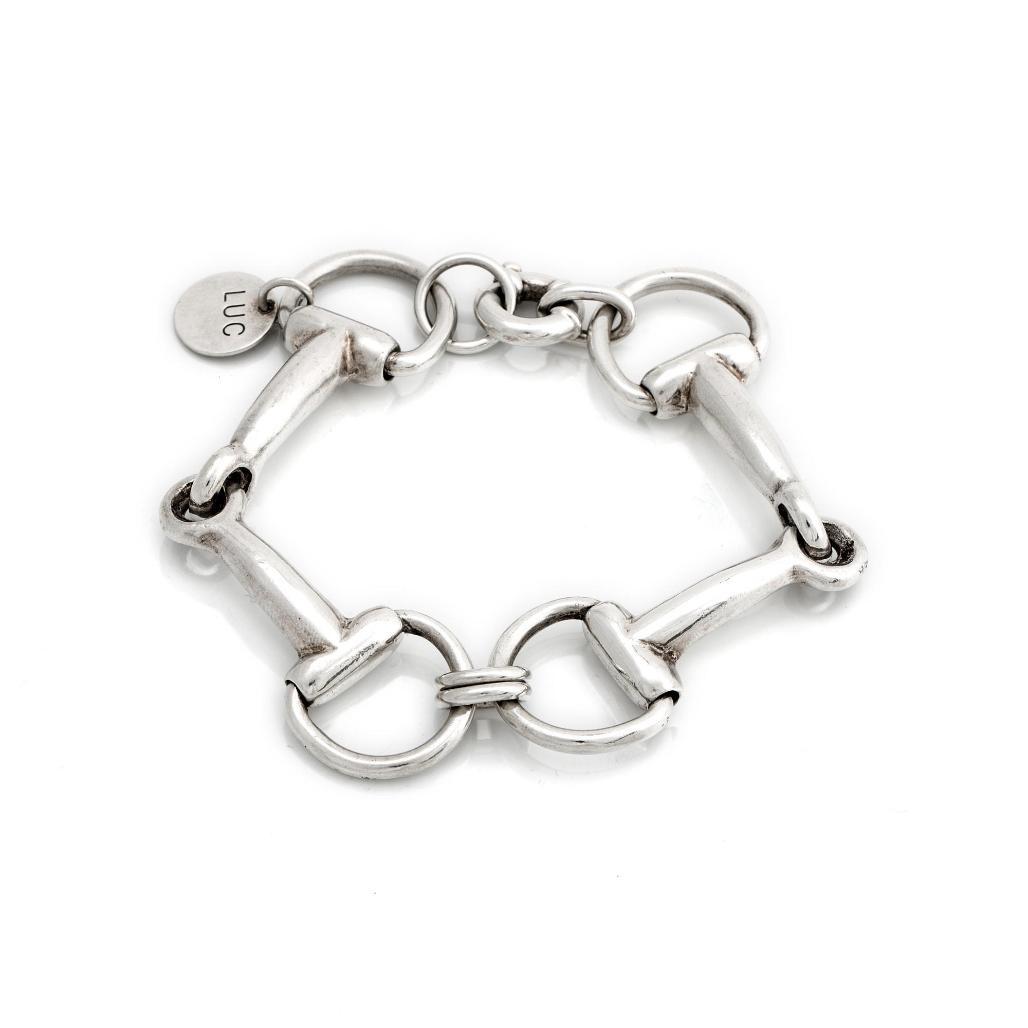 ARMBAND, silver i form av hästbetsel.