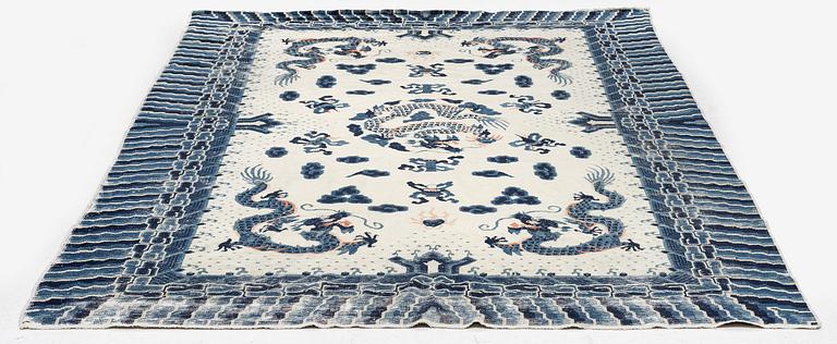 An antique Chinese ' five dragon rug', c. 280 x 190 cm.