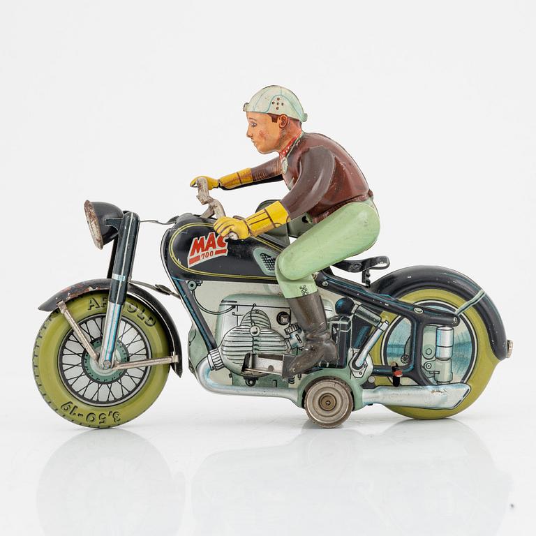A tin motorcycle, 'Mac 700' from Arnold, Germany, around mid 20th Century.