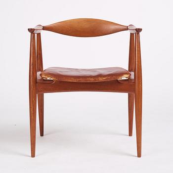 Hans J Wegner, a teak and brown leather 'CH-35', Carl Hansen & Son, Denmark 1950-60s.