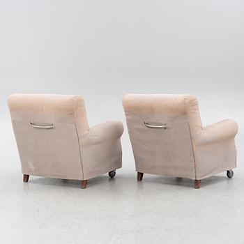 A pair of lounge chairs, 'Nonnamaria', Flexform.