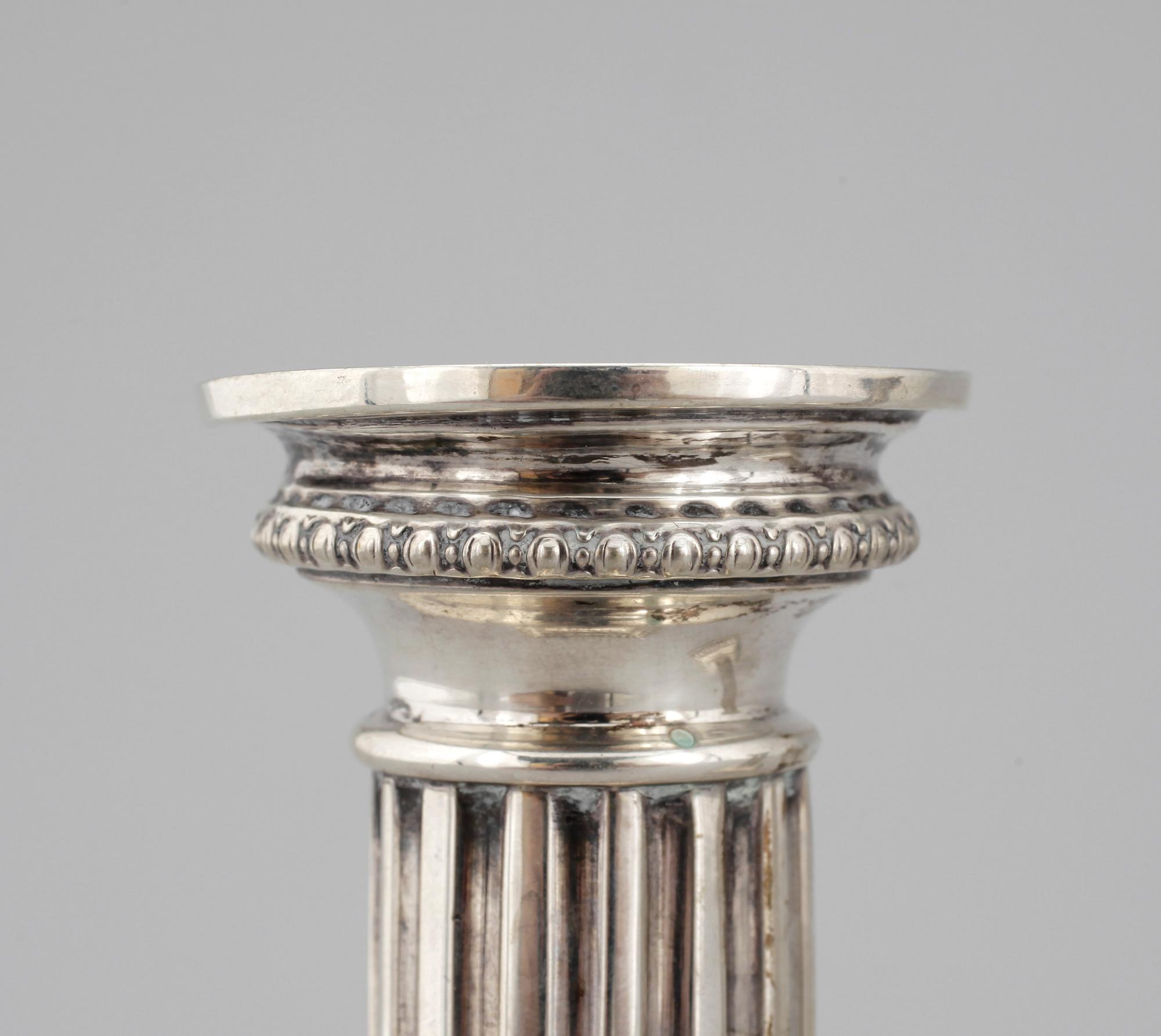 LJUSTAKAR, ett par. Silver. Michael Borg,   Tyskland. 1800/1900-tal. Silverhalt 800. Vikt ca 567g.