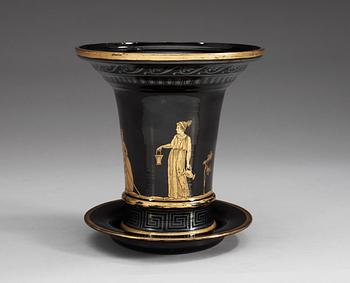 A Russian gilt black Etruscan style glass cache-pot with stand, circa 1800.