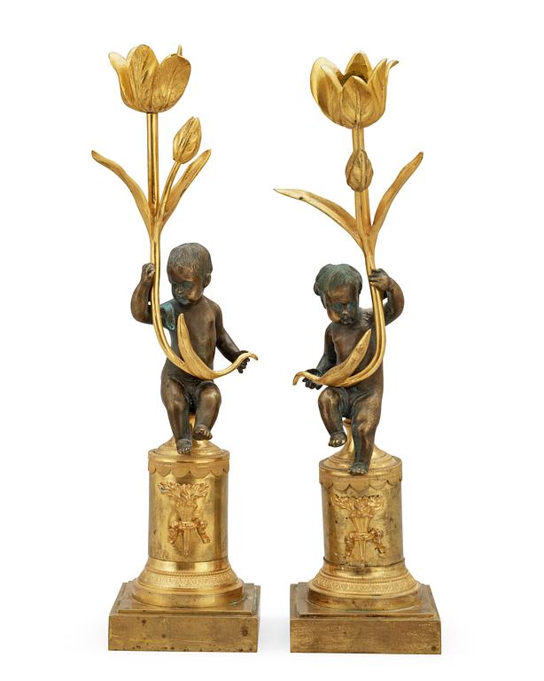 A pair of Louis XVI late 18th century candlesticks.