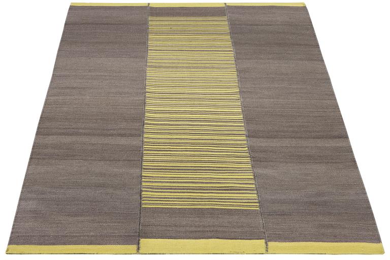 A Kilim rug, c. 235 x 173 cm.