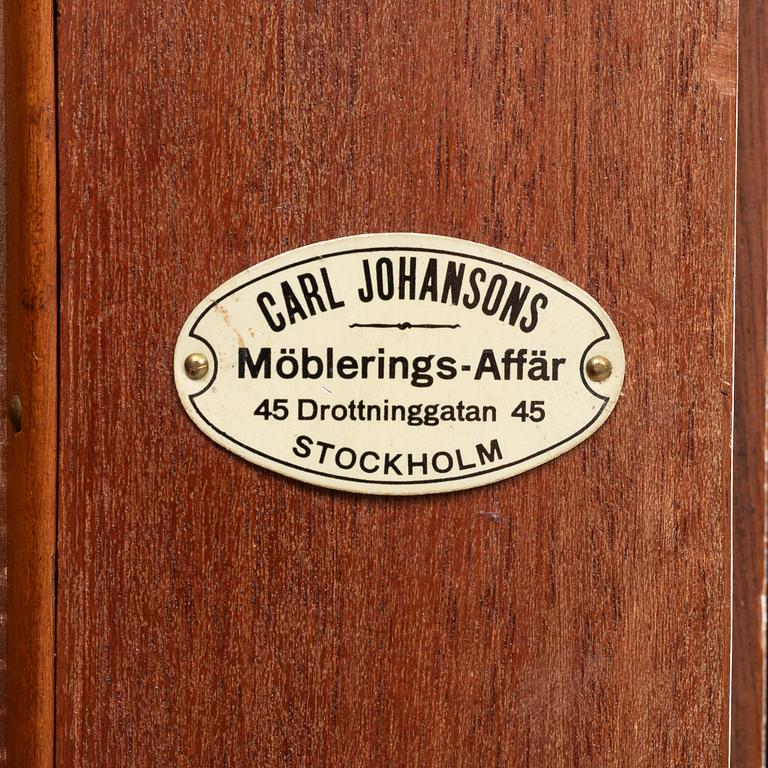 A mahogny veneered art noveau archive cabinet, early 20th Century.