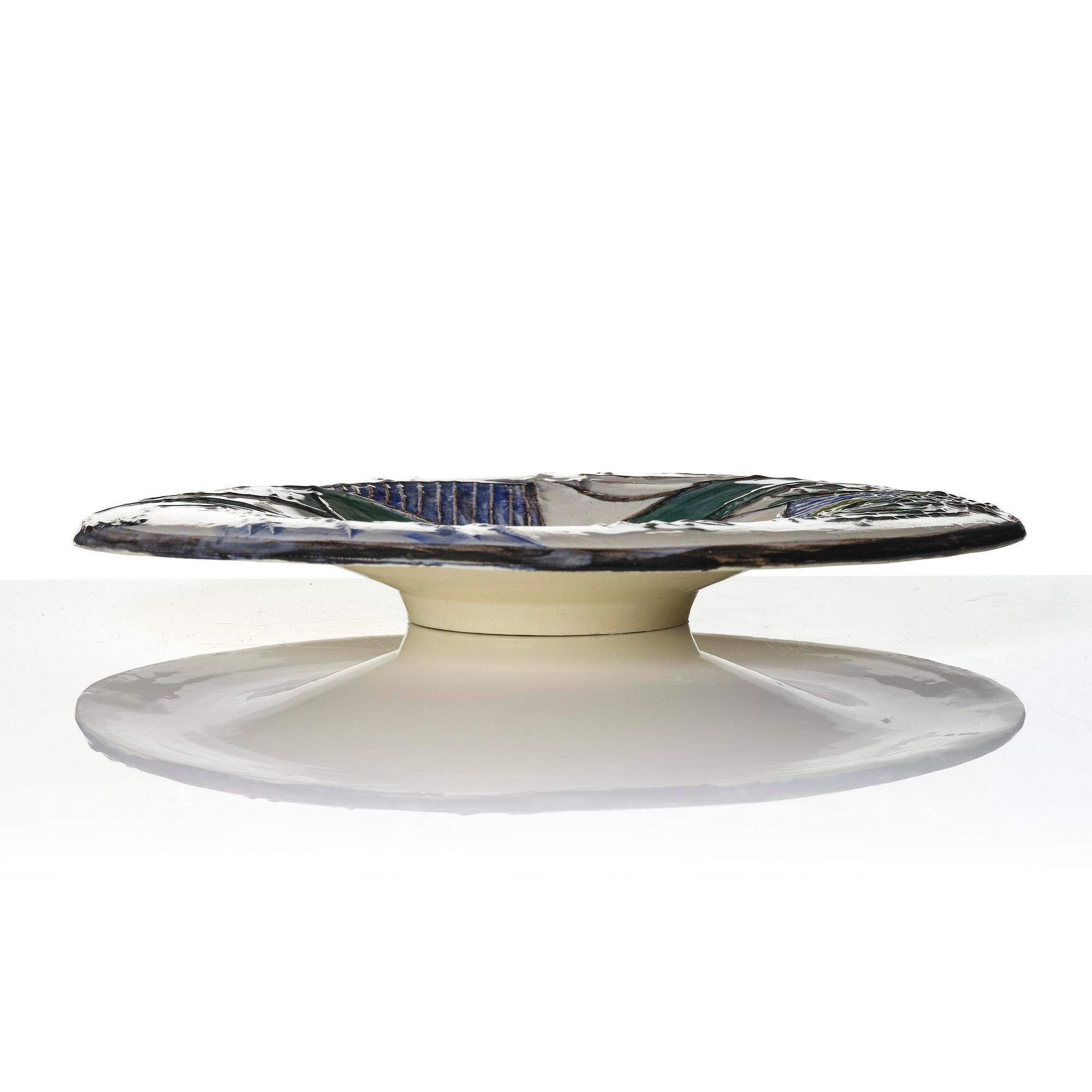 Pablo Picasso, a "Femme échevelée" (A.R. 509) faience dish, Madoura, Vallauris, France, post 1963.