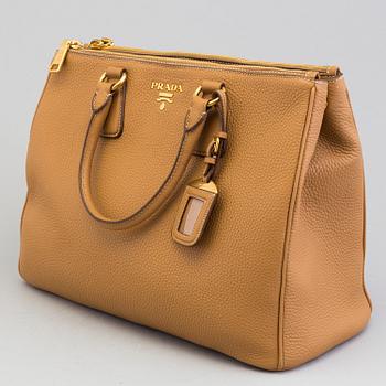 A Prada bag in vitello daino leather.