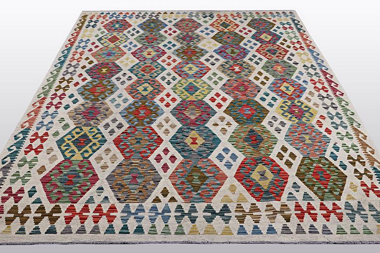 A carpet, kilim, ca 300 x 207 cm.
