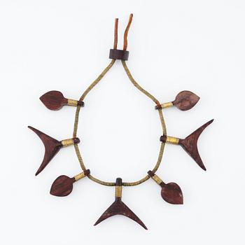 Vivianna Torun Bülow-Hübe, a leather necklace with brass and carved wooden details, most likely 1948-1949.