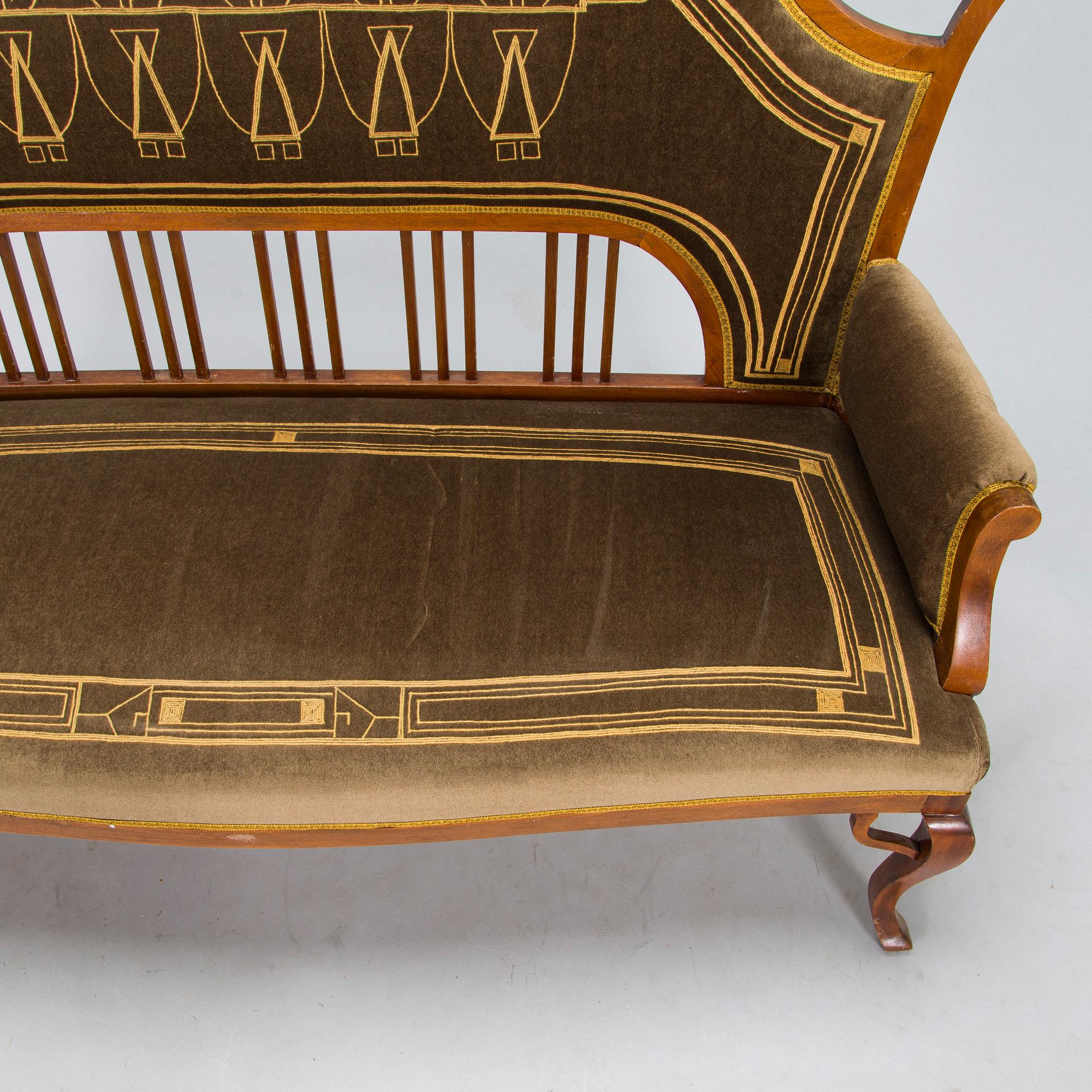 An eight piece Art Nouveau lounge suite in mahogany, Belgium/Netherlands, early 20th century.