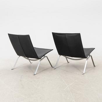 A pair of "PK22" leather armchairs by Poul Kjaerholm for E Kold Christensen, Denmark.