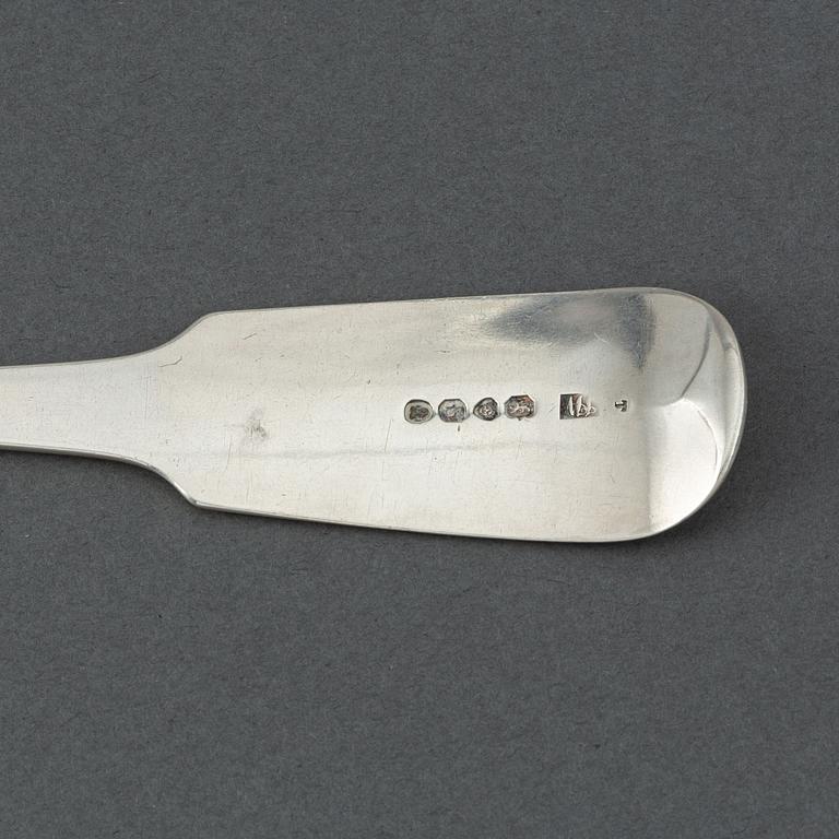 John Whiting, a silver serving spoon, London, England, 1833.