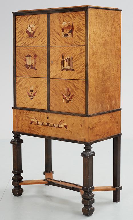 A Carl Malmsten birch cabinet with inalys of different coloured woods, probably by NK, circa 1925.