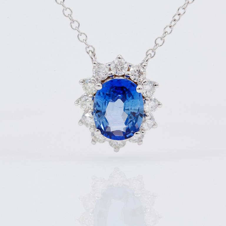 HÄNGE MED KEDJA, diamanter totalt ca 0,40 ct, blå safir ca 1,40 ct.