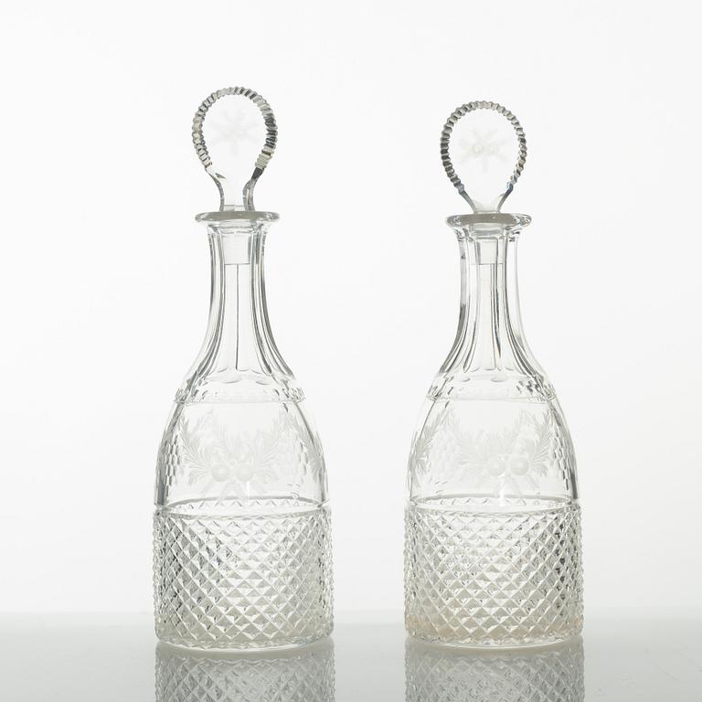 Two glass decanters, around the year 1900.