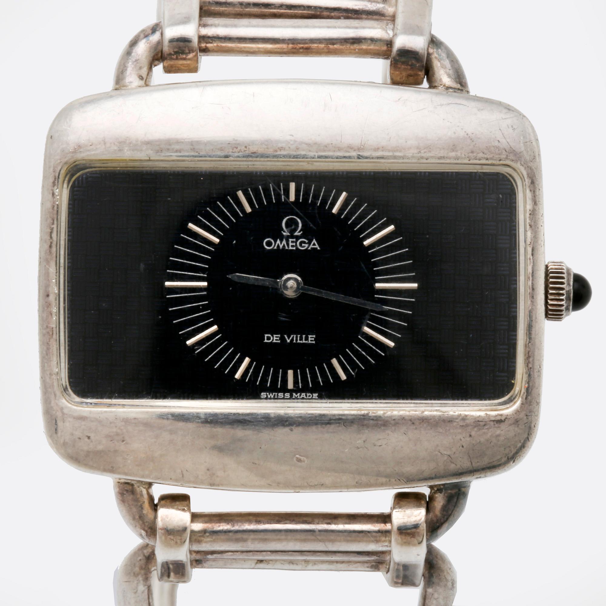 Omega armbandsur, silver, manuell, ca 42 x 30 mm, armband i silver längd ca 20,5 cm.