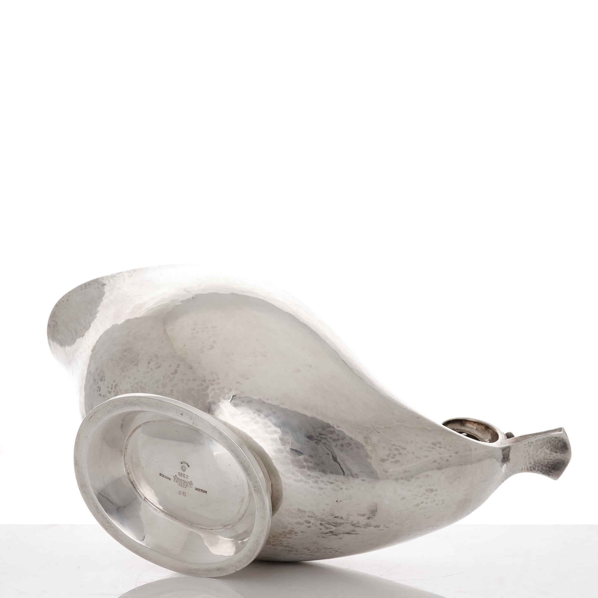 Georg Jensen, a sterling silver sauceboat and ladle, Copenhagen 1925-1945, design nr 98 and 141.