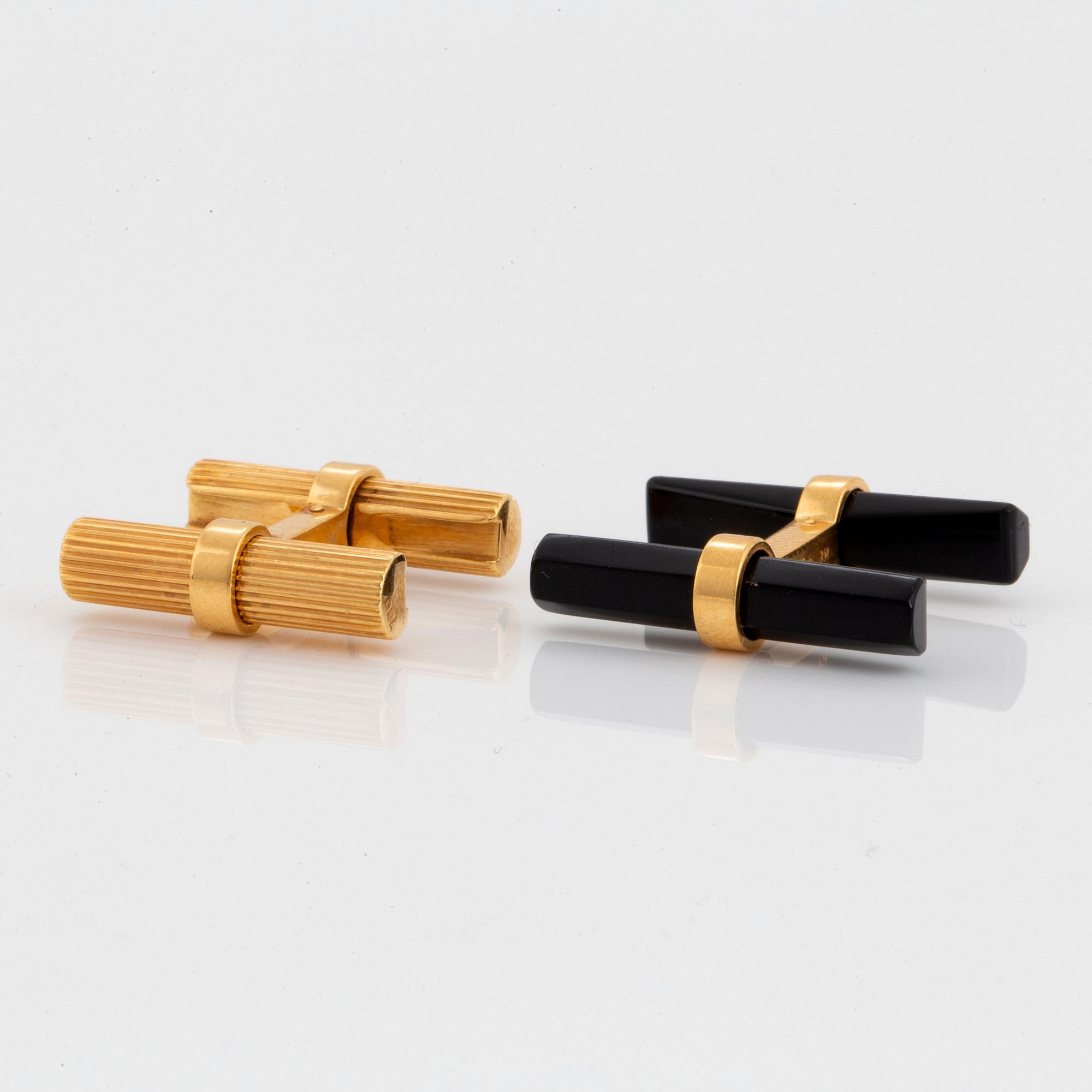 Cartier manschettknappar 18K guld och onyx.