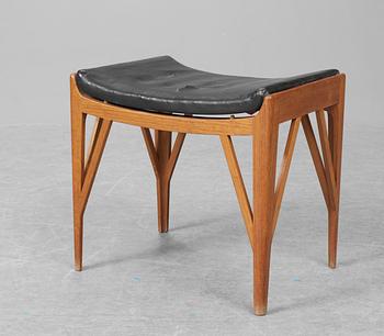 A Carl-Axel Acking teak and black leather stool probably by Åhmans Möbelfabrik, Åhus 1950-60's.