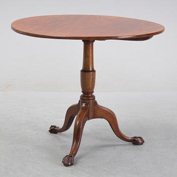 A mahogany folding table, England circa 1800.