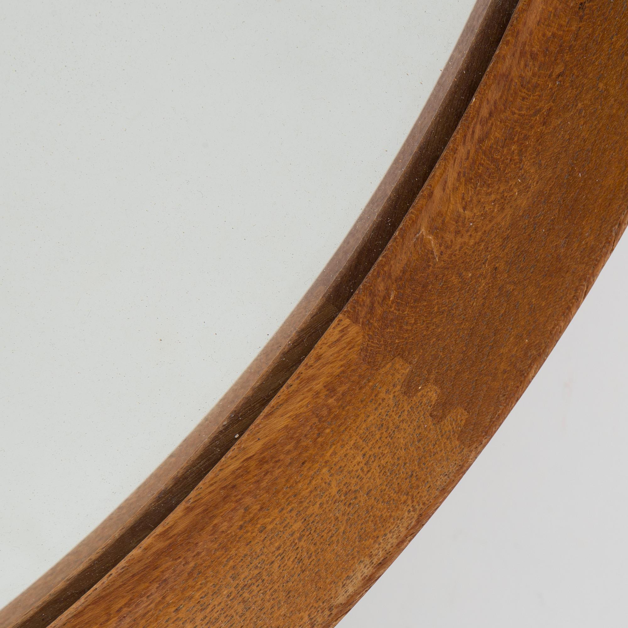 A mirror by Uno & Östen Kristiansson, Luxus, Vittsjö.