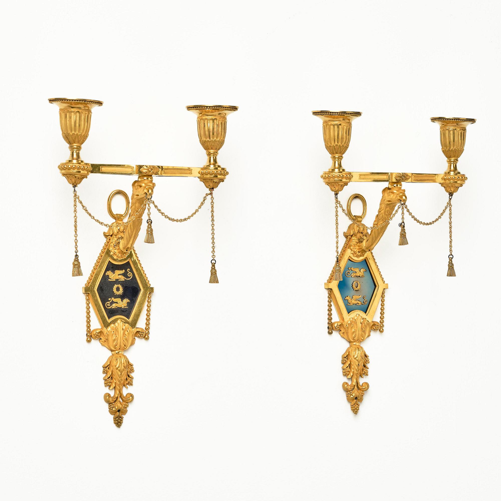 A pair of two-branch late Louis XVI ormolu and blued steel appliques attr. to F. Rémond (bronzier in Paris 1774-1812).