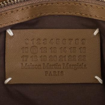 a Maison Martin Margiela leather bag.