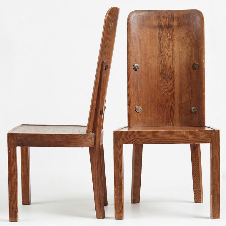 Axel Einar Hjorth, a set of 4 stained pine "Lovö" chairs, Nordiska Kompaniet, 1930's.