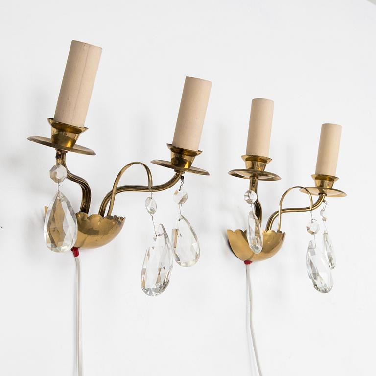 Four of mid-20th century wall sconces.