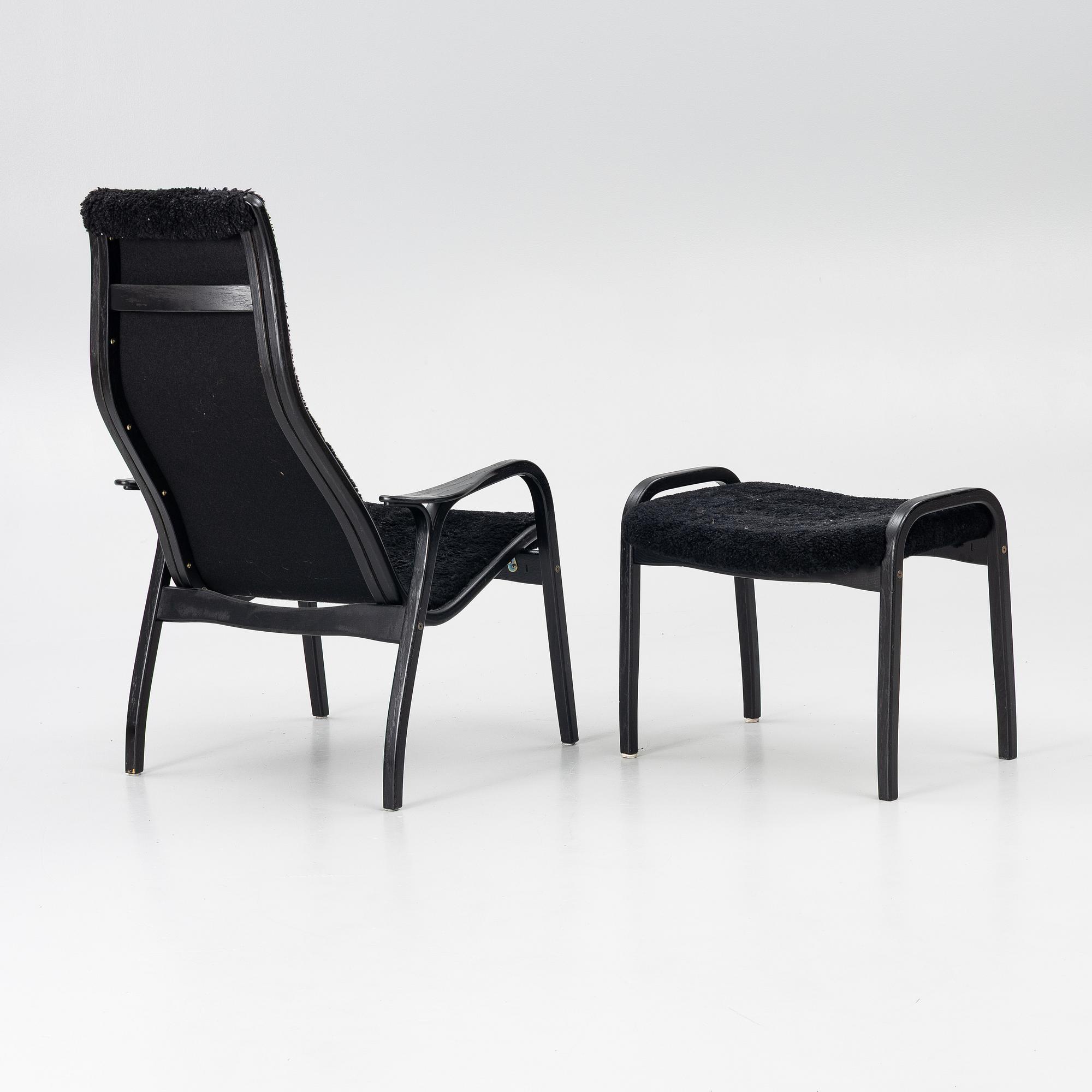 Yngve Ekström, a 'Lamino' easy chair with foot stool, Swedese 2010.